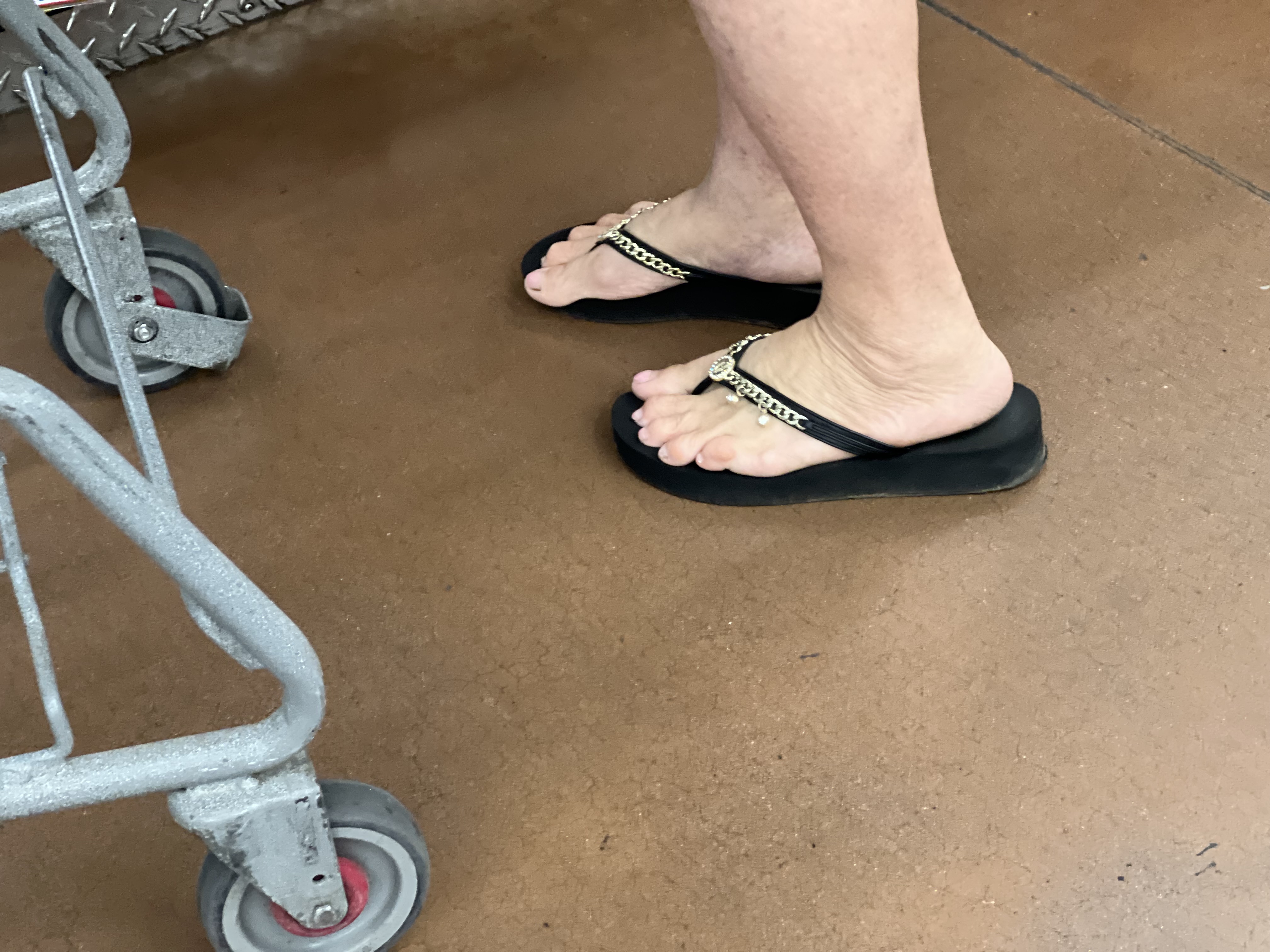 Gilf and milf feet at supermarket — 27